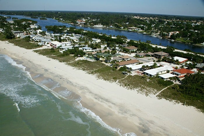 Aerial view showing beach at A Place to Be Motel on Casey Key