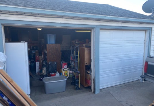2 Car Garage with Auto Opener and Door to Backyard